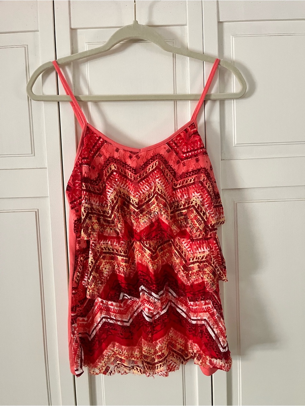No Boundaries Coral Red Layered Chevron Camisole